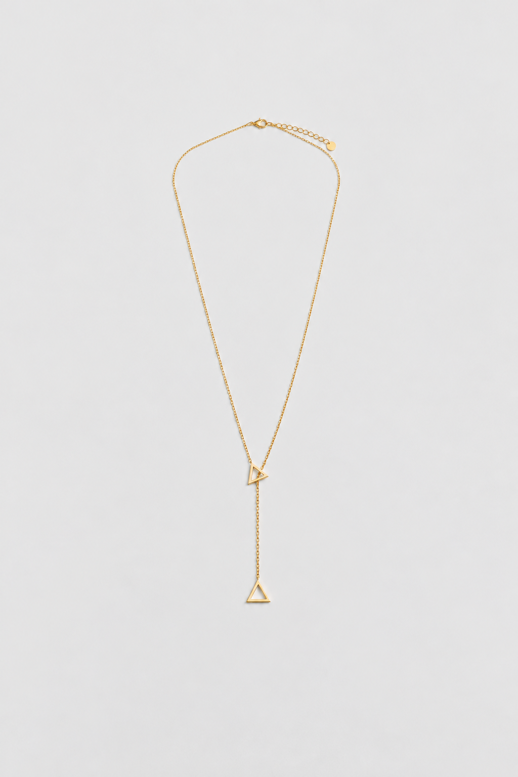 Collar triangulo